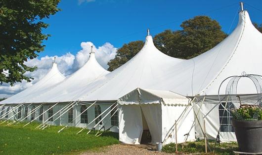 high-quality portable toilets stationed at a wedding, meeting the needs of guests throughout the outdoor reception in Coopersville